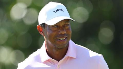 Tiger Woods in a baseball cap