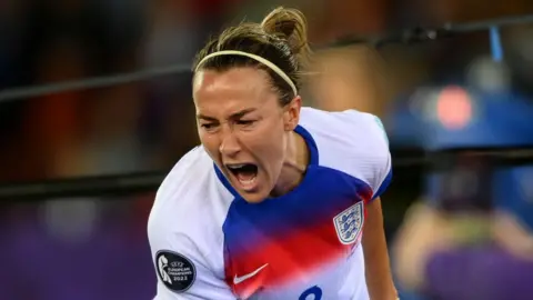Lucy Bronze celebrates