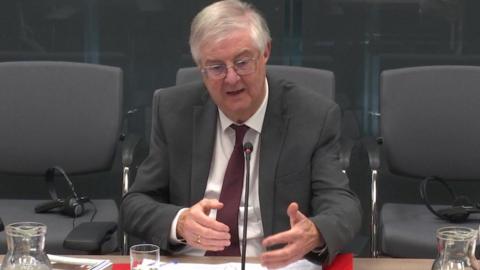 Mark Drakeford appearing before the Senedd's Finance Committee