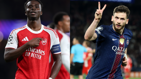 Bukayo Saka and Khvicha Kvaratskhelia of Paris Saint-Germain celebrate