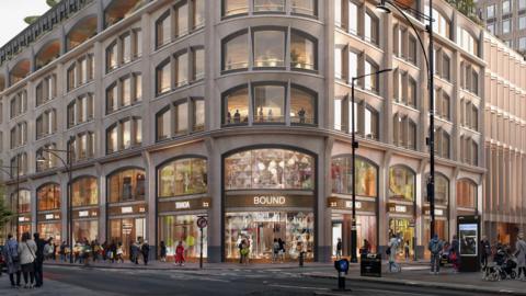 A computer generated image of the exterior of the proposed development, which shows a variety of shops on the ground floor. 