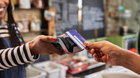 Person using card to pay