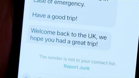 A phone showing phone messages. One message says, Have a good trip! the message sent after it says, Welcome back to the UK, we hope you had a great trip!