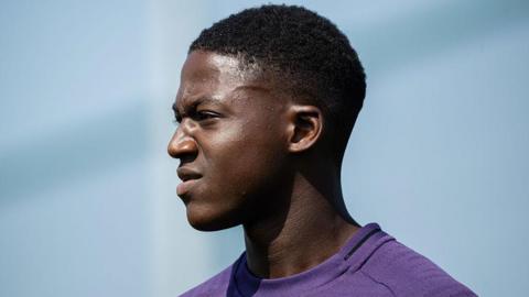 Kobbie Mainoo in action during a first team training session at Carrington Training Ground