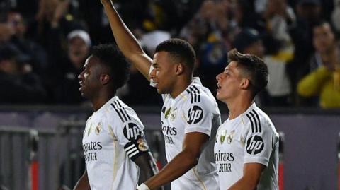 Kylian Mbappe (centre) celebrates scoring for Real Madrid against Kairat
