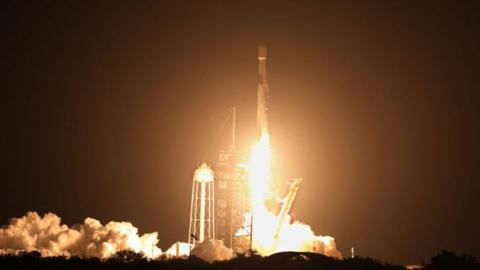File image of a a Space X Falcon 9 rocket launching from Cape Canaveral, Florida, on 15 January 2025. Flame from the rocket are visible at the base as it hurtles into the air