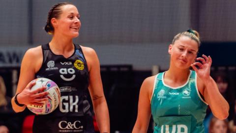 Manchester Thunder goalkeeper Josie Huckle and Dragons wing attack Bethan Dyke
