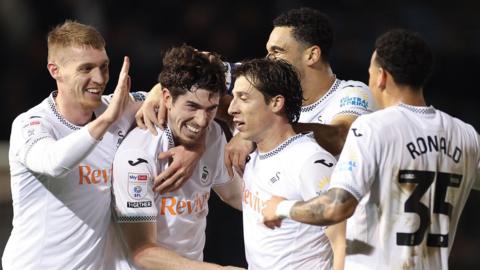 Josh Key celebrates with Swansea team-mates 