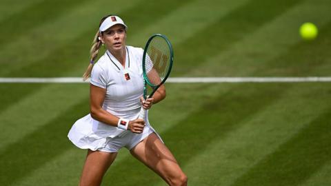Katie Boulter of Great Britain in action against Tyra Caterina Grant of Italy during the Ladies' Singles first round match on Day Two of The Championships Wimbledon 2026 at All England Lawn Tennis and Croquet Club on June 30, 2026 in London, England
