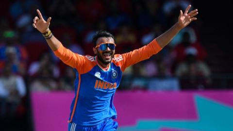 India bowler Axar Patel celebrates taking a wicket