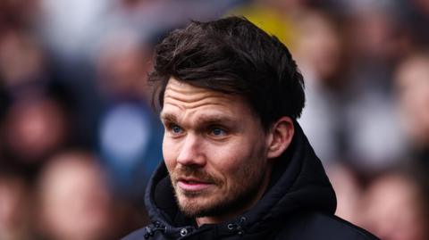 Sheffield Wednesday manager Danny Rohl watches on during his side's 2-1 defeat to Coventry City