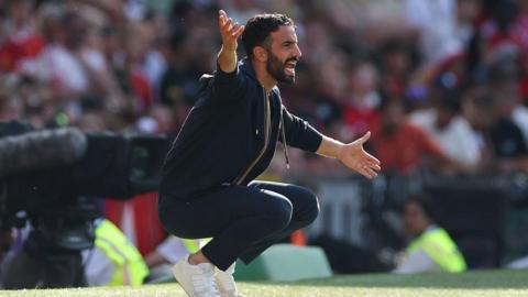Ruben Amorim on the touchline with his arms wide open