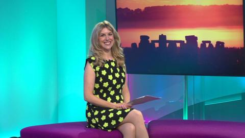 Jenny in the studio with Stonehenge in the screen