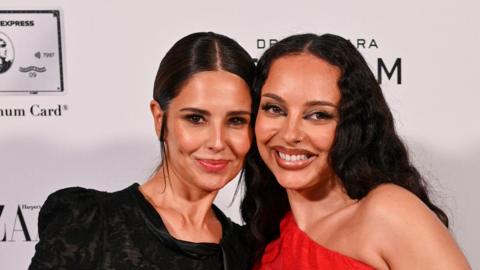 Cheryl and Jade Thirlwall, winner of the Musician award, pose in the winners room at the 2025 Harper's Bazaar Women of the Year Award