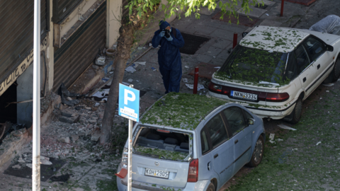 Greek police search for evidences after a bomb explosion outside an National Bank branch in Thessaloniki, Greece on 3 May 2025