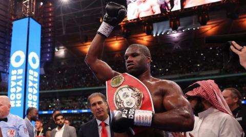 Daniel Dubois celebrates after beating Anthony Joshua