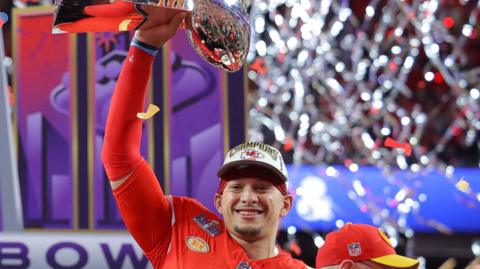 Kansas City Chiefs quarterback Patrick Mahomes with the Super Bowl trophy in 2024