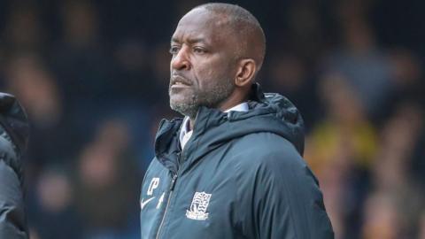 Chris Powell watching a game from the touchline in his time as Southend United boss