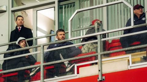 Michael Carrick sitting next to Jonathan Woodgate and Steve Holland during Manchester United's Premier League International Cup win