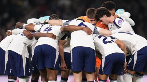 Tottenham players in a huddle