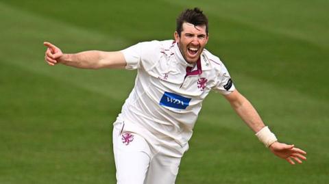 Craig Overton celebrates