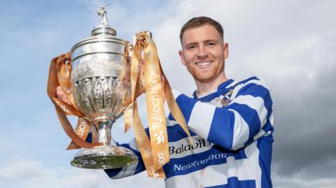 A delighted Newtonmore captain Craig Ritchie with the Camanachd Cup.  Newtonmore v Kingussie in the Tulloch Homes Camanachd Cup Final, played at The Bug
