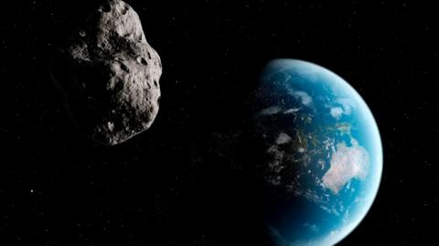 Asteroid shown approaching earth in artists image 