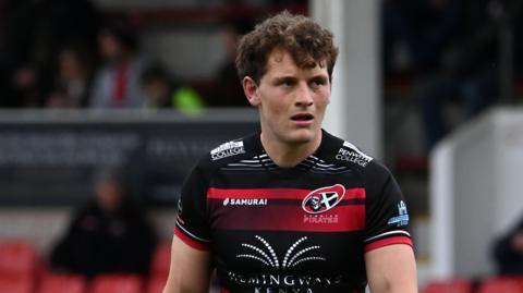 Harry Bazalgette about to take a kick during a game for Cornish Pirates