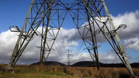A view of the electricity pylons by the Ffos-Y-Fran opencast coal mine in Merthyr Tydfil, Wales.