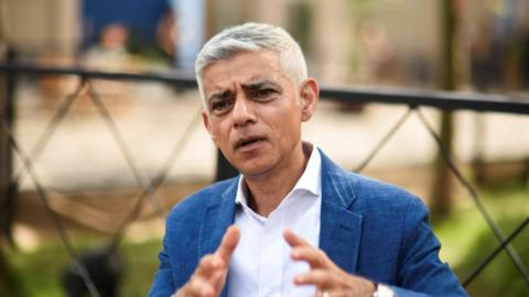 London Mayor Sadiq Khan speaks during an interview