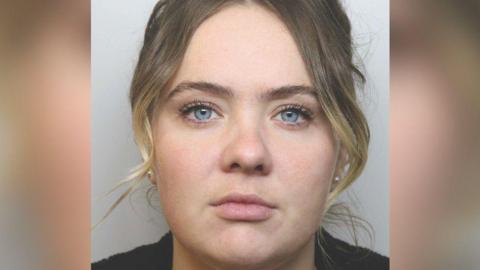 Mugshot of Molly Breen who has fair hair tied back and blue eyes