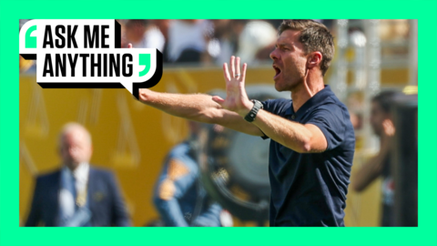 Xabi Alonso giving instructions to his players from the touchline. The image is surrounded by a green border with 'Ask Me Anything' in the top corner.