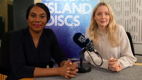 Kemi Badenoch sitting with Lauren Laverne in the Desert Island Disc studio with a microphone between them