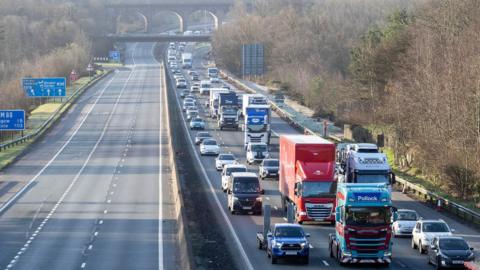 Lines of traffic on one side of a dual carriageway