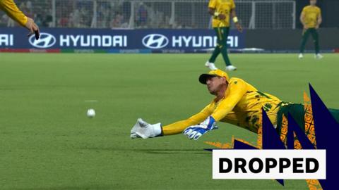 Quinton de Kock diving for the ball