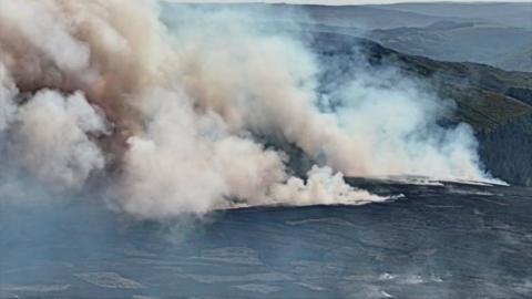Drone footage of fire near Snake Pass