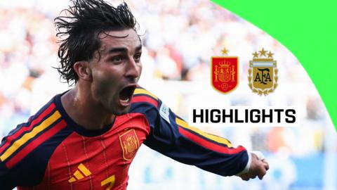 Ferran Torres runs and shouts to celebrate scoring for Spain in the World Cup final.