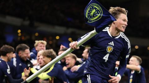 Scott McTominay celebrates Scotland reaching the World Cup