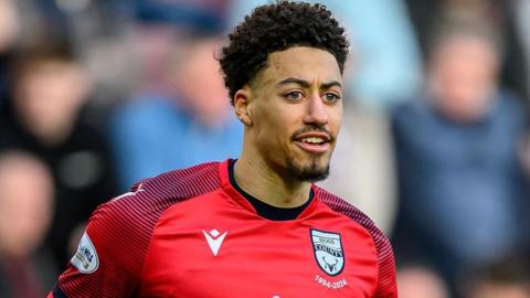 Jonathan Tomkinson while playing for Ross County