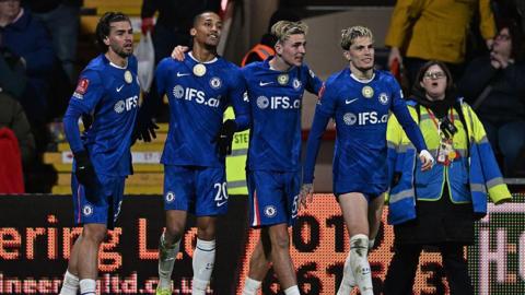Marc Guiu, Joao Pedro, Jesse Derry and Alejandro Garnacho celebrate an extra-time goal. 