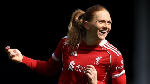 Ceri Holland celebrates for Liverpool