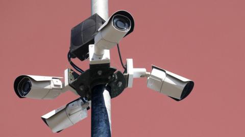 Surveillance cameras - stock photo