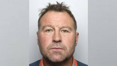 A police mugshot of Tony Marsden