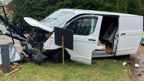 The written-off van following the crash with a lot of damage to the front of the vehicle