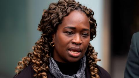 Kadi Johnson, sister of Sheku Bayoh speaking to journalists outside the public inquiry in Edinburgh