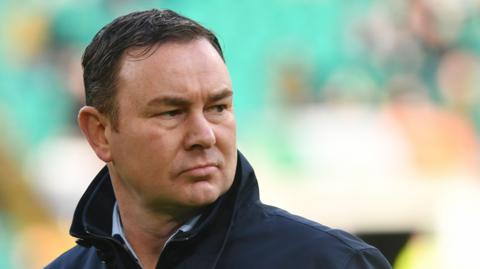 Derek Adams watches from the sidelines