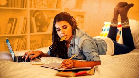 Girl eating while studying