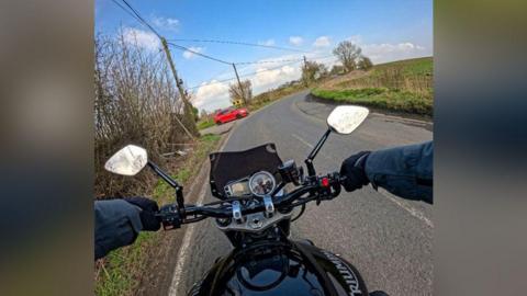 POV person on a motorbike