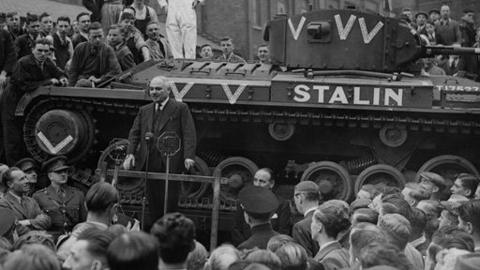 Ivan Mikhailovich Maisky gives an address to crowds in front of a tank.