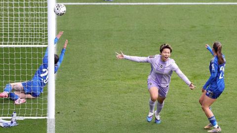 Kiko Seike celebrates after scoring for Brighton against Leicester City.